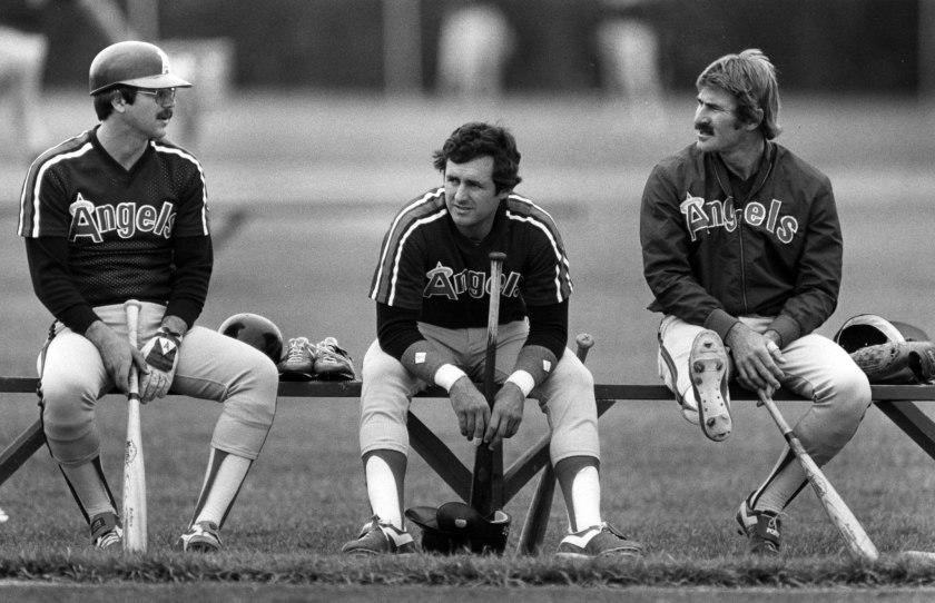 March 1983: Angels Tim Foli, left, Fred Lynn and Bobby Brich chat between batting practice during spring camp in Casa Grande, Arizona. This photo was published in the March 28, 1983 Los Angeles Times.