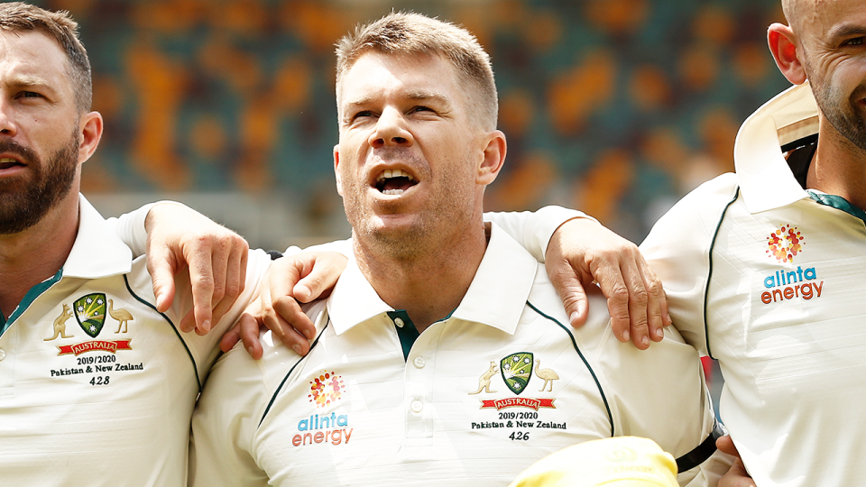 David Warner (pictured) singing the national anthem.