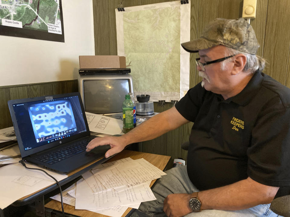 Treasure hunter Dennis Parada, owner of Finders Keepers, talks about the FBI's 2018 dig for Civil War-era gold in an interview at his office in Clearfield, Penn., Jan. 6, 2023. Parada is pressing the FBI to release more documents related to the dig, which he suspects found gold but which the FBI insists came up empty. (AP Photo/Michael Rubinkam)