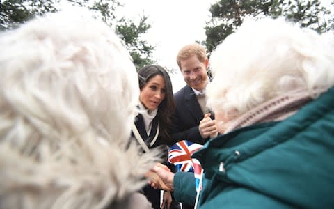 Prince Harry and Meghan Markle meet Irene Gould and June Dickinson - Credit: PA