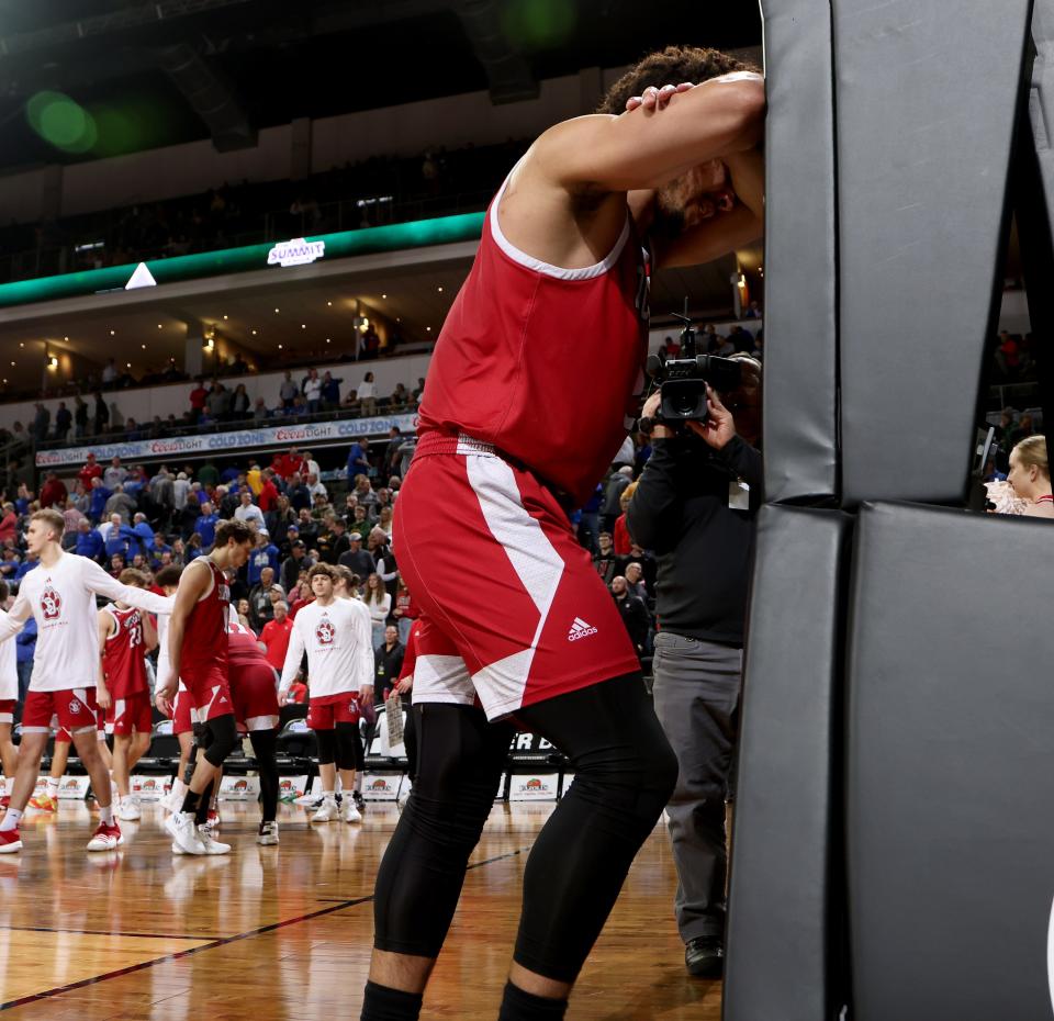 Damani Hayes #2 of the South Dakota Coyotes shows emotion after tough, close loss against the North Dakota State Bison, 68-70, at the 2023 Summit League Basketball Championship at the Denny Sanford Premier Center in Sioux Falls, South Dakota. (Photo by Dave Eggen/Inertia)