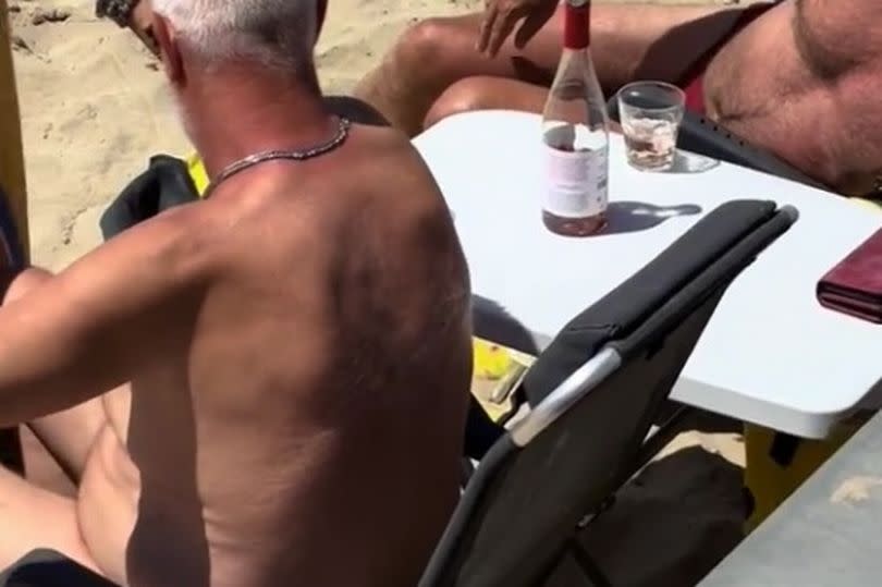 A video grab of the police clamping down on people drinking on a beach in Benidorm