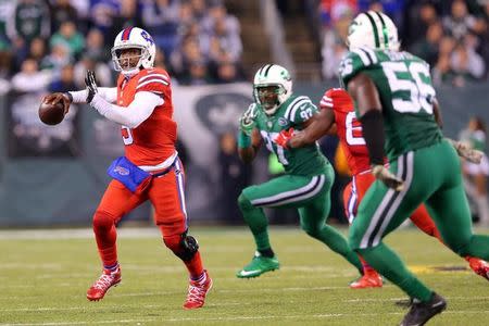 Nov 12, 2015; East Rutherford, NJ, USA; Buffalo Bills quarterback Tyrod Taylor (5) passes the ball against the New York Jets during the second quarter at MetLife Stadium. Mandatory Credit: Brad Penner-USA TODAY Sports