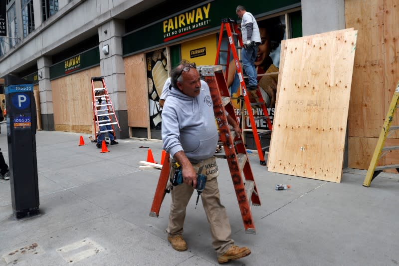 Businesses in midtown Manhattan boarded up during continued protests in New York