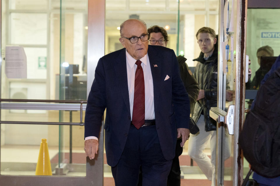 Former Mayor of New York Rudy Giuliani leaves the federal courthouse in Washington, Monday, Dec. 11, 2023. The trial will determine how much Rudy Giuliani will have to pay two Georgia election workers who he falsely accused of fraud while pushing President Donald Trump's baseless claims after he lost the 2020 election. (AP Photo/Jose Luis Magana)