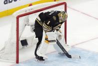 Boston Bruins' Jeremy Swayman pauses after a goal by Florida Panthers' Brandon Montour during the third period in Game 3 of an NHL hockey Stanley Cup second-round playoff series Friday, May 10, 2024, in Boston. (AP Photo/Michael Dwyer)