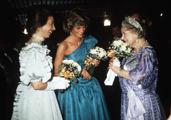 <p>Princess Anne, Princess Diana, and the Queen Mother share a moment at the royal premiere of <em>A Passage to India</em>.</p>