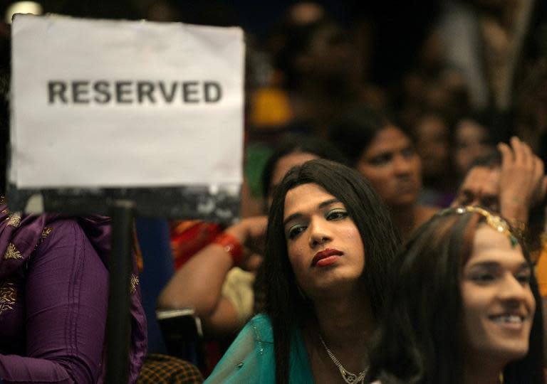 In this photograph taken on October 3, 2013, Indian transgenders attend a seminar for the transgender community in Mumbai