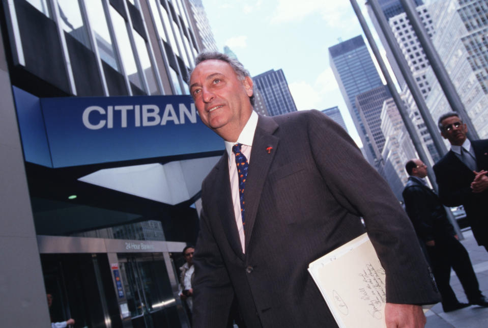 Sanford I. Weill, CEO of Travelers Group, on his way to a press conference to annouce the merger. (Photo by James Leynse/Corbis via Getty Images)