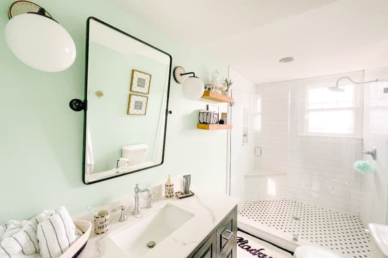 Black and white tiles in bathroom after renovation.