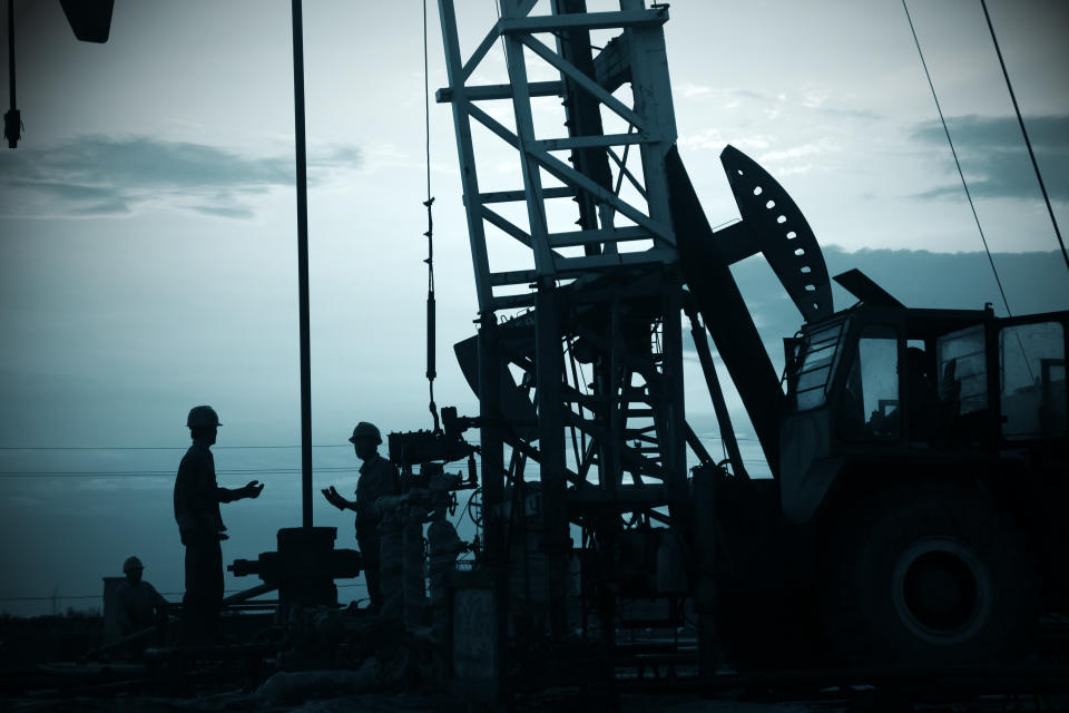 Oil workers working on a rig.