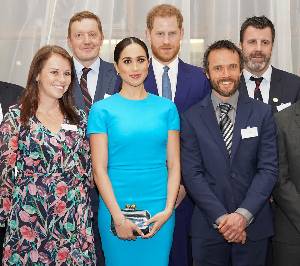 Britain's Prince Harry (4th-L), Duke of Sussex, and Meghan (3rd-L), Duchess of Sussex attend the Endeavour Fund Awards at Mansion House in London on March 5, 2020. - The Endeavour Fund helps servicemen and women have the opportunity to rediscover their self-belief and fighting spirit through physical challenges. (Photo by Paul Edwards / POOL / AFP) (Photo by PAUL EDWARDS/POOL/AFP via Getty Images)