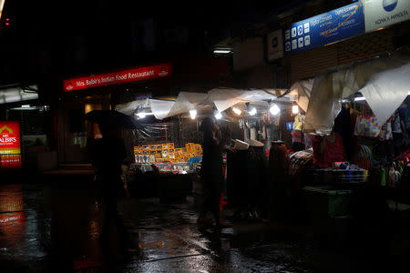 Street vendors sell clothes in Sukhumvit Soi 11 in Bangkok, Thailand, September 12, 2018. REUTERS/Soe Zeya Tun