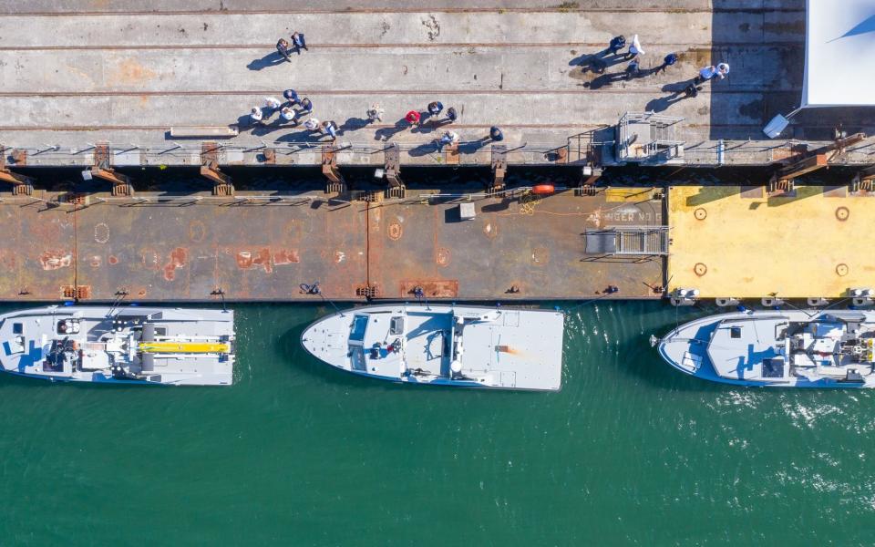 Aerial view of the unmanned vessels, showing the size of the towed sonar.  - Shaun Roster