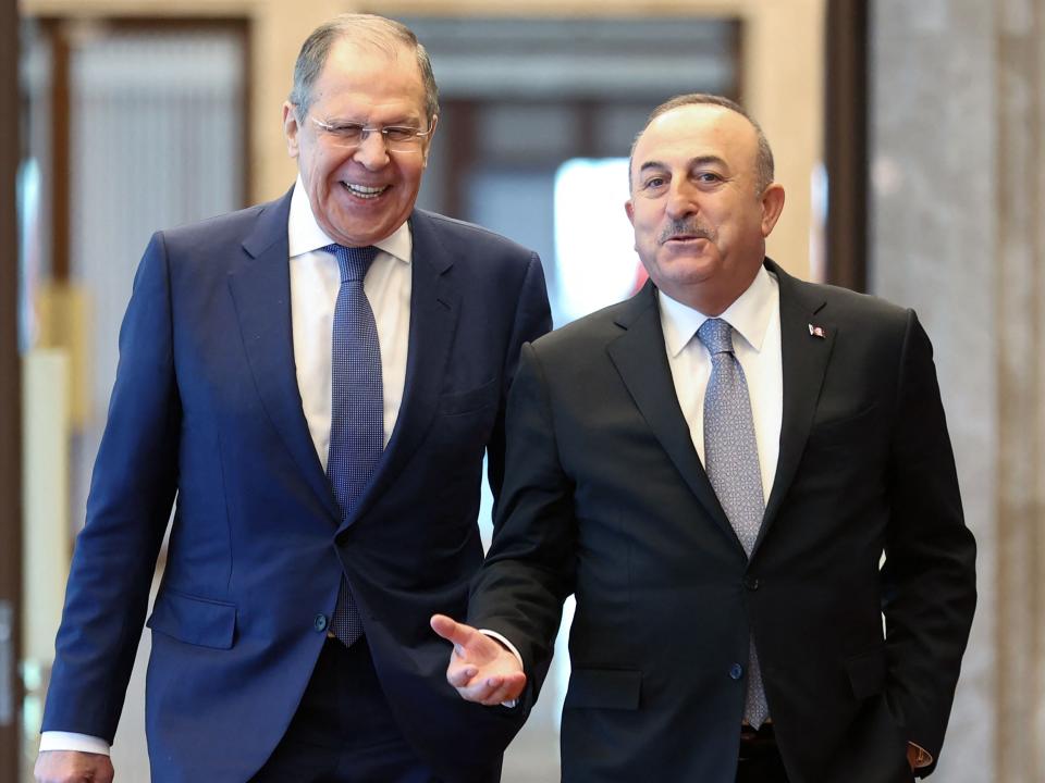 Sergei Lavrov speaks with Mevlut Cavusoglu as they meet in Ankara (AFP via Getty Images)