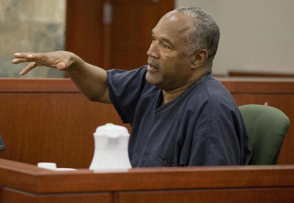 O.J. Simpson testifies during an evidentiary hearing in Clark County District Court, Wednesday, May 15, 2013 in Las Vegas. Simpson, who is currently serving a nine to 33-year sentence in state prison as a result of his October 2008 conviction for armed robbery and kidnapping charges, is using a writ of habeas corpus, to seek a new trial, claiming he had such bad representation that his conviction should be reversed. (AP Photo/Julie Jacobson, Pool)