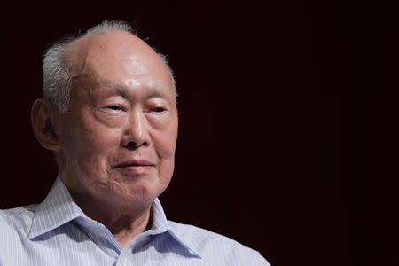 Former Singapore Prime Minister Lee Kuan Yew (LKY) smiles as he attends the LKY School of Public Policy 7th anniversary dialogue session in Singapore September 14, 2011. REUTERS/Tim Chong/Files