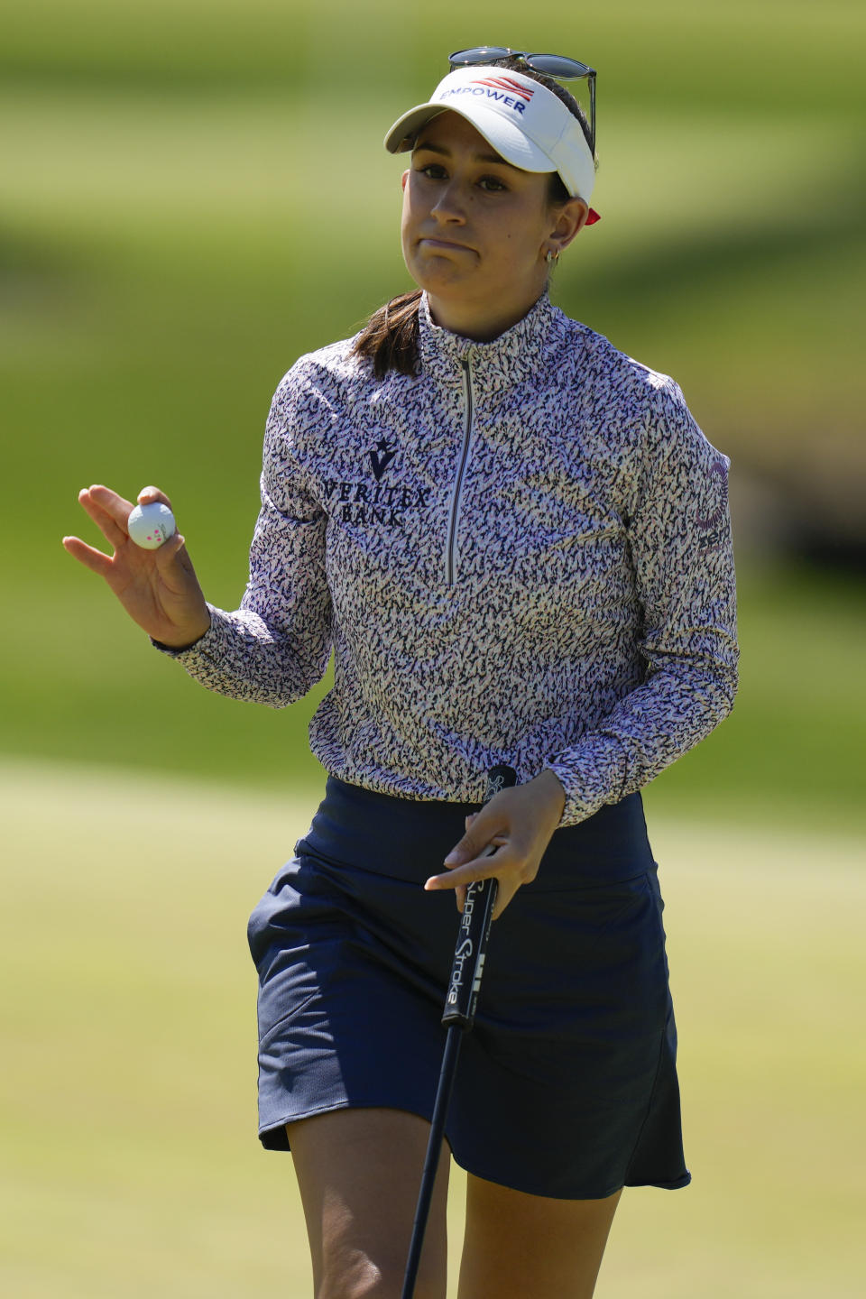 Cheyenne Knight, of the United States, reacts after sinking a putt on the second hole during the final round of the LPGA Cognizant Founders Cup golf tournament, Sunday, May 14, 2023, in Clifton, N.J. (AP Photo/Seth Wenig)