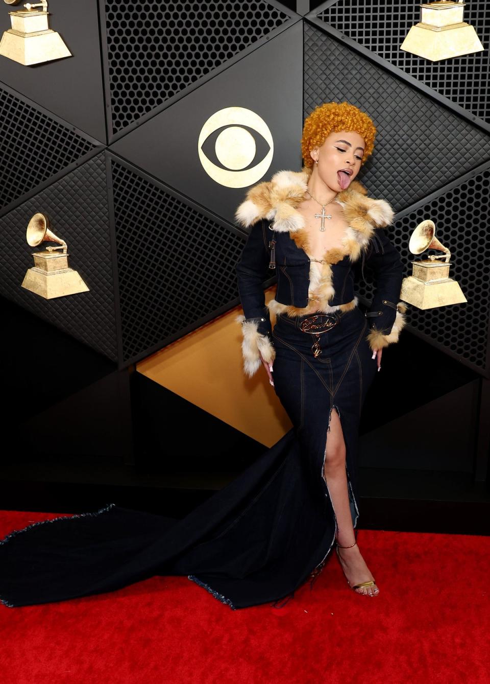 Ice Spice wearing Baby Phat with fur trim at the Grammys on February 04, 2024 (Getty Images for The Recording A)