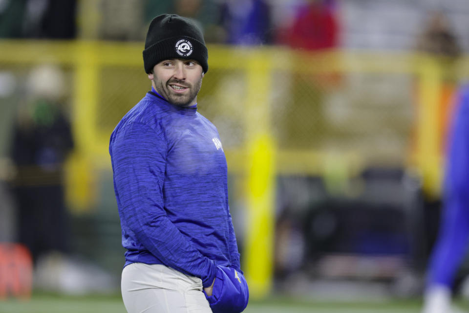 Los angles Rams quarterback Baker Mayfield (17) warms up before an NFL football game against the Green Bay Packers in Green Bay, Wis. Monday, Dec. 19, 2022. (AP Photo/Matt Ludtke)