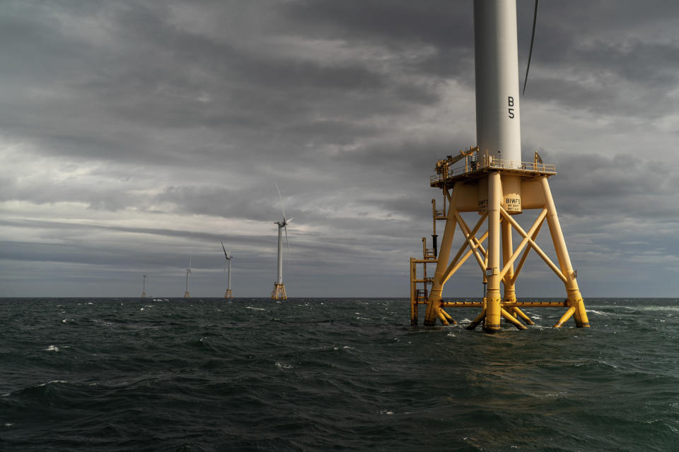 FILE- The five turbines of America's first offshore wind farm, owned by the Danish company, Orsted, stand off the coast of Block Island, R.I., on Oct. 17, 2022. As the U.S. races to build offshore wind power projects that will transform coastlines from Maine to South Carolina, much remains unknown about how the facilities could affect the environment. And that has some people concerned, particularly those who depend on the sea for their livelihoods. (AP Photo/David Goldman)