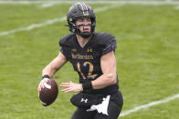 Northwestern quarterback Peyton Ramsey throws a pass against Illinois during the first half of an NCAA college basketball game in Evanston, Ill., Saturday, Dec. 12, 2020. (AP Photo/Nam Y. Huh)