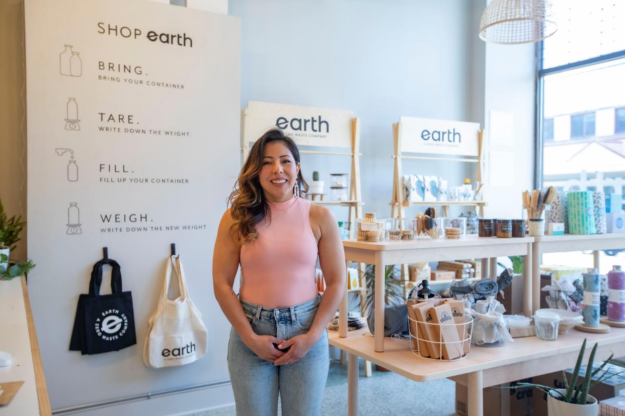 Ade Villatoro, owner of Earth Zero Waste, stands Friday, April 14, 2023, inside her store at 327 W. Jefferson St. in Rockford. She will celebrate her first Earth Day as owner of the store.