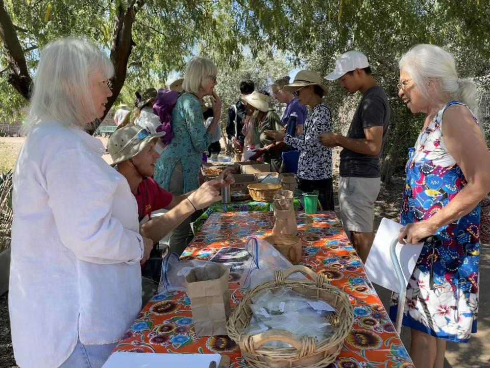 Mission Garden volunteers talk to Tucson residents and gardeners and present them to Chinese heirloom seed varieties. The story and seed swap, on Saturday, May 27, 2023, was done in celebration of Asian American and Pacific Islander Heritage Month.