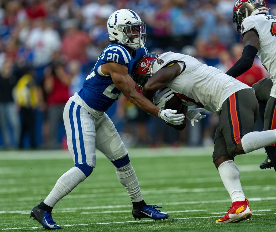 Colts safety Nick Cross makes a tackle in a preseason game against the Buccaneers.
