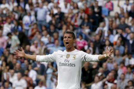 Real Madrid's striker Cristiano Ronaldo reacts during their Spanish First Division soccer match against Levante at Santiago Bernabeu stadium in Madrid, October 17, 2015. REUTERS/Juan Medina -