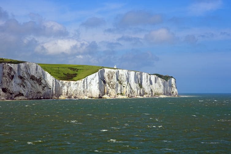 <span class="caption">The chalk is made up of ancient pulverised shells of tiny organisms called coccolithophore.</span> <span class="attribution"><a class="link " href="https://www.shutterstock.com/image-photo/white-cliffs-dover-10809583?src=k_N56tCyDT8V8GCYR590hA-1-23" rel="nofollow noopener" target="_blank" data-ylk="slk:John Hemmings/Shutterstock.com;elm:context_link;itc:0;sec:content-canvas">John Hemmings/Shutterstock.com</a></span>