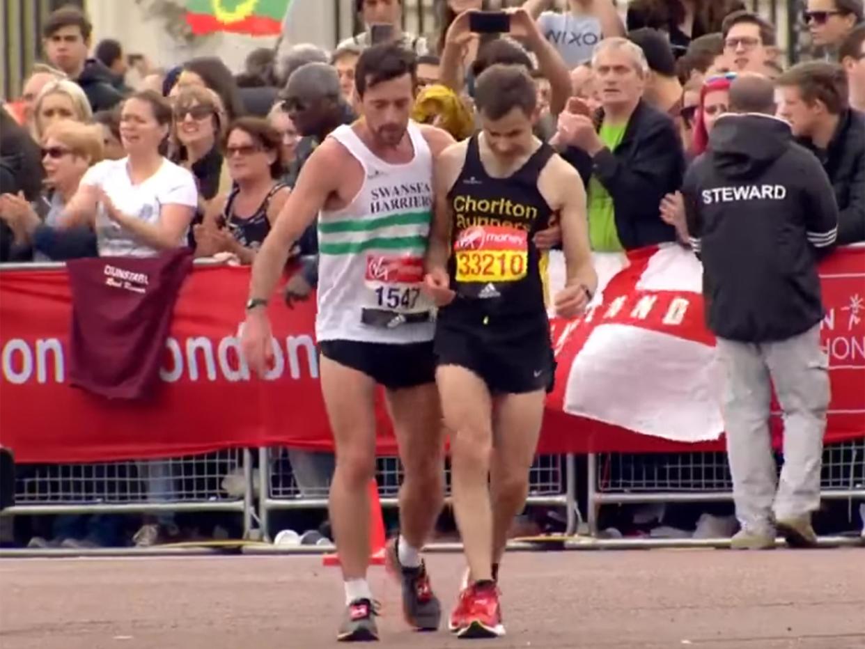 Swansea Harriers runner helps David Wyeth: Youtube/Screengrab