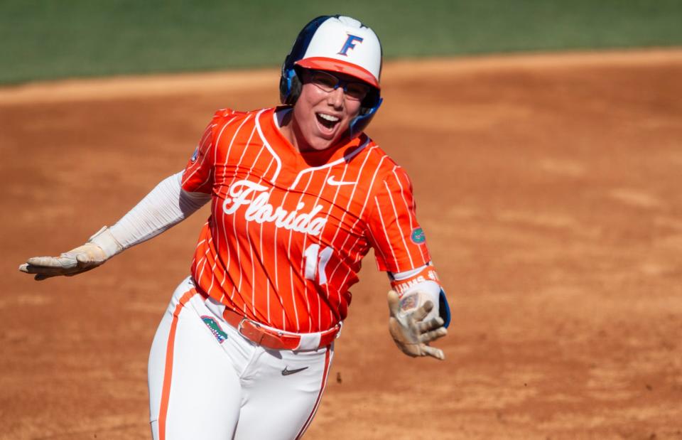 Florida Gators infielder Mia Williams (11) celebrates her home run as Florida Gators and Missouri Tigers face of in the SEC softball tournament championship game at Jane B. Moore Field in Auburn, Ala., on Saturday, May 11, 2024.