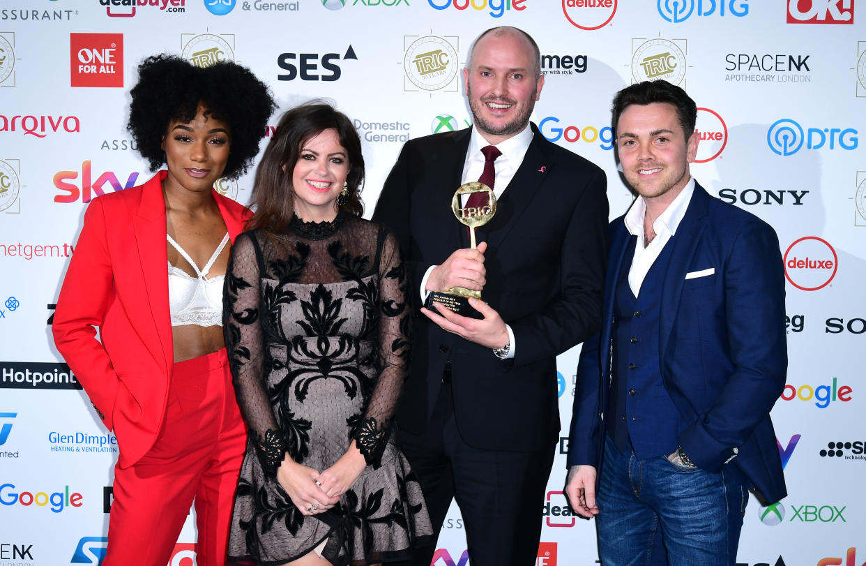 Rachel Adedeji (left), Deborah James, Steve Bland (second right) and Ray Quinn (right) with the award for Best Podcast for the show You, Me and the Big C at the TRIC Awards 2019 50th Birthday Celebration held at the Grosvenor House Hotel, London.