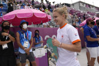 Roos Zwetsloot of the Netherlands walks from the course after a run in the women's street skateboarding finals at the 2020 Summer Olympics, Monday, July 26, 2021, in Tokyo, Japan. (AP Photo/Ben Curtis)