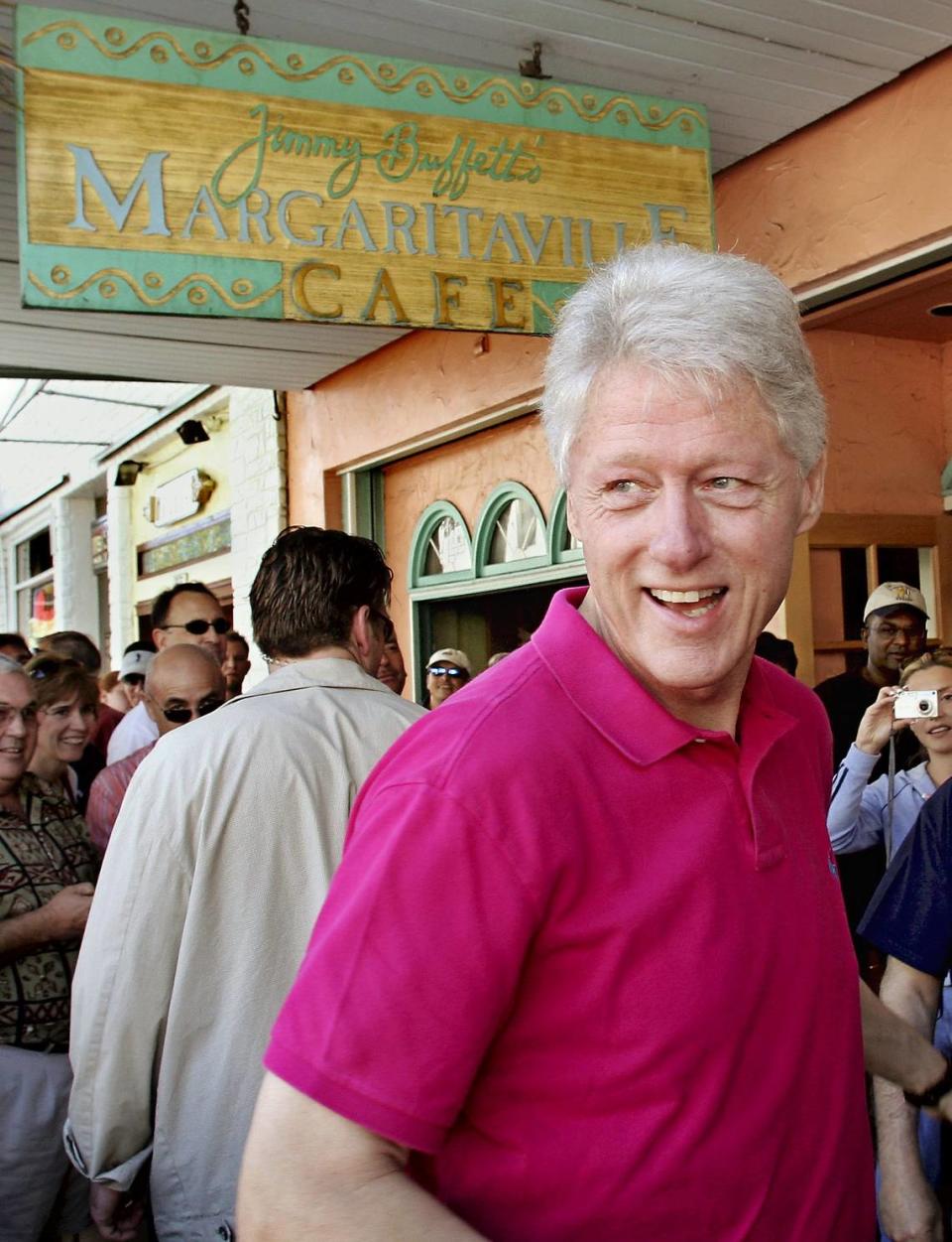 In this picture, released by the Florida Keys News Bureau, former President Bill Clinton prepares to enter singer Jimmy Buffett’s restaurant “Margaritaville” on Duval Street in Key West, Fla., Saturday, Jan. 22, 2005. Clinton was in Key West with wife, Sen. Hillary Rodham Clinton D-N.Y., for two weekend political fund-raisers on the subtropical island. (AP Photo/Florida Keys News Bureau, Rob O’Neal)