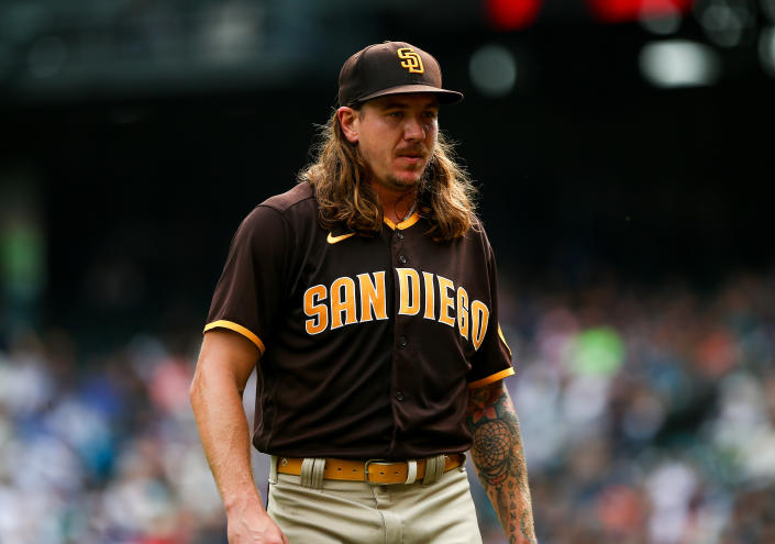 Sep 14, 2022; Seattle, Washington, USA;  San Diego Padres starting pitcher Mike Clevinger (52) walks off the field after throwing against the Seattle Mariners during the first inning at T-Mobile Park. Mandatory Credit: Lindsey Wasson-USA TODAY Sports