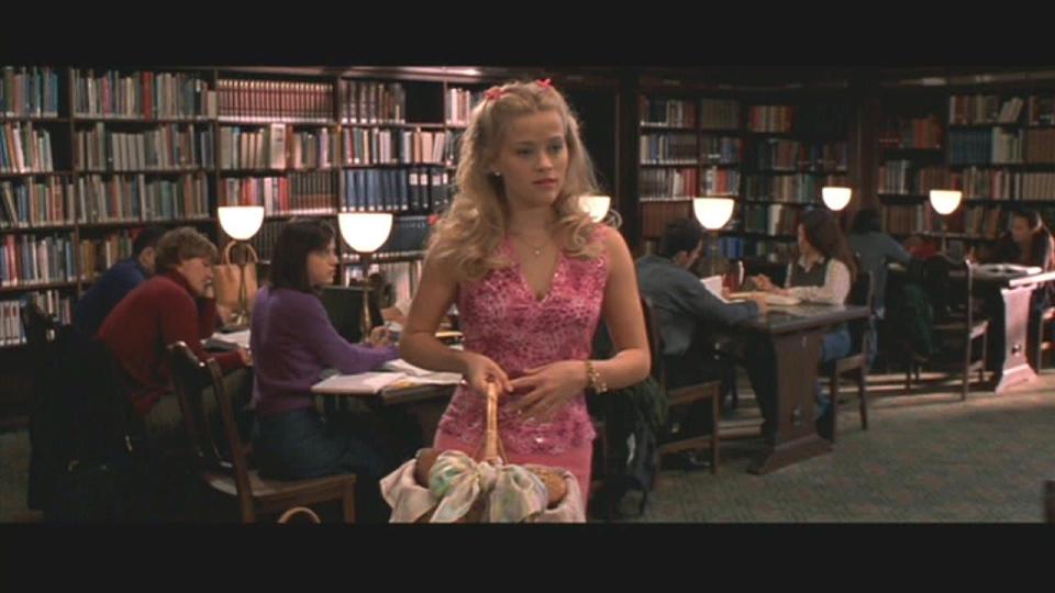 <p>Elle is still the ultimate California girl in her fuchsia, halter neck dress. She doesn’t care at all that students of Harvard think she looks a little crazy. Elle is not afraid to work hard and standout from the crowd. Top tip: brighten up the stuffy library with a fun outfit.<br></p><p>[Photo: Screengrab]</p>