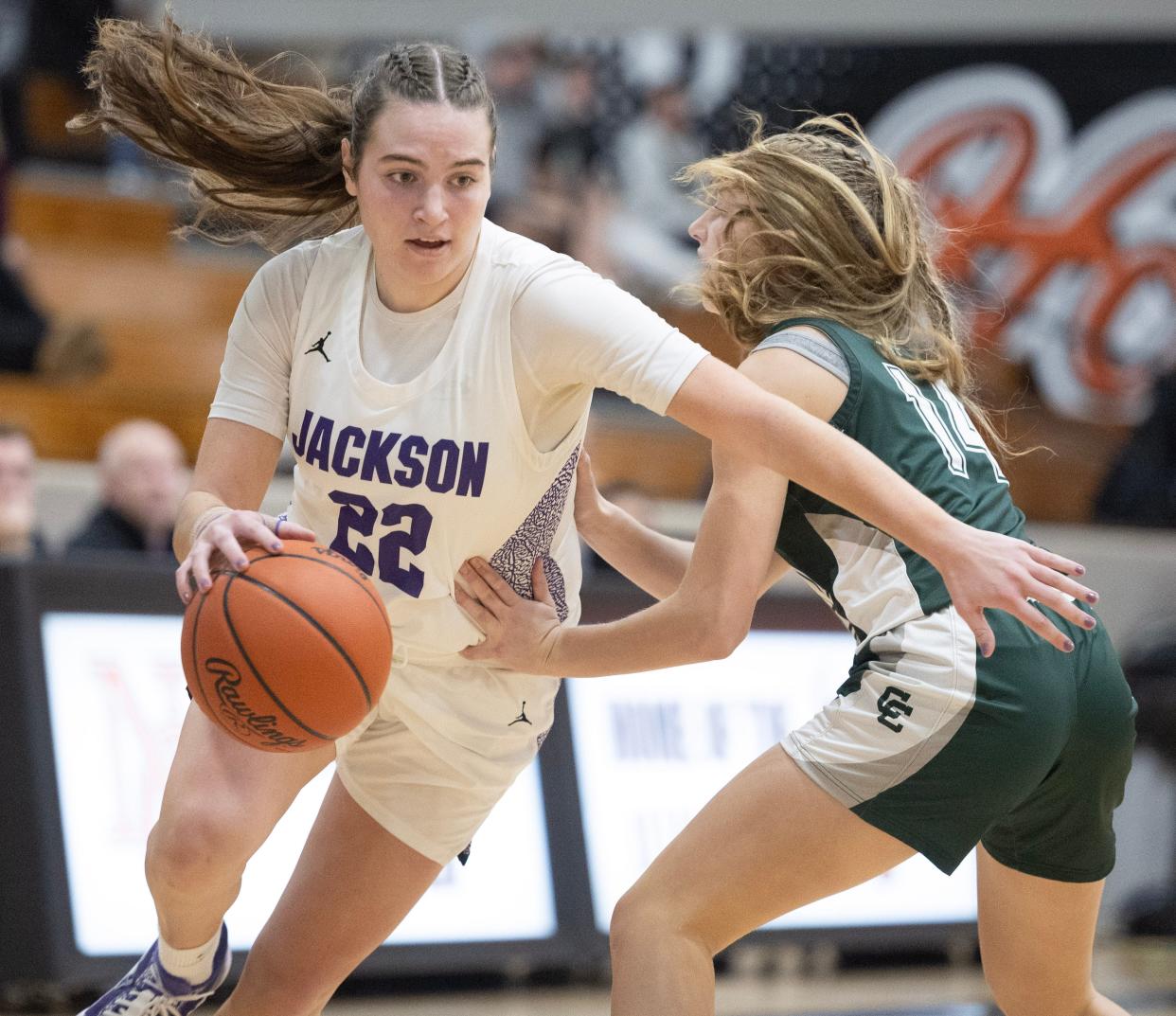 Jackson's Megan Campbell gets past Central Catholic's Grace Finefrock in the second half of Wednesday's game.