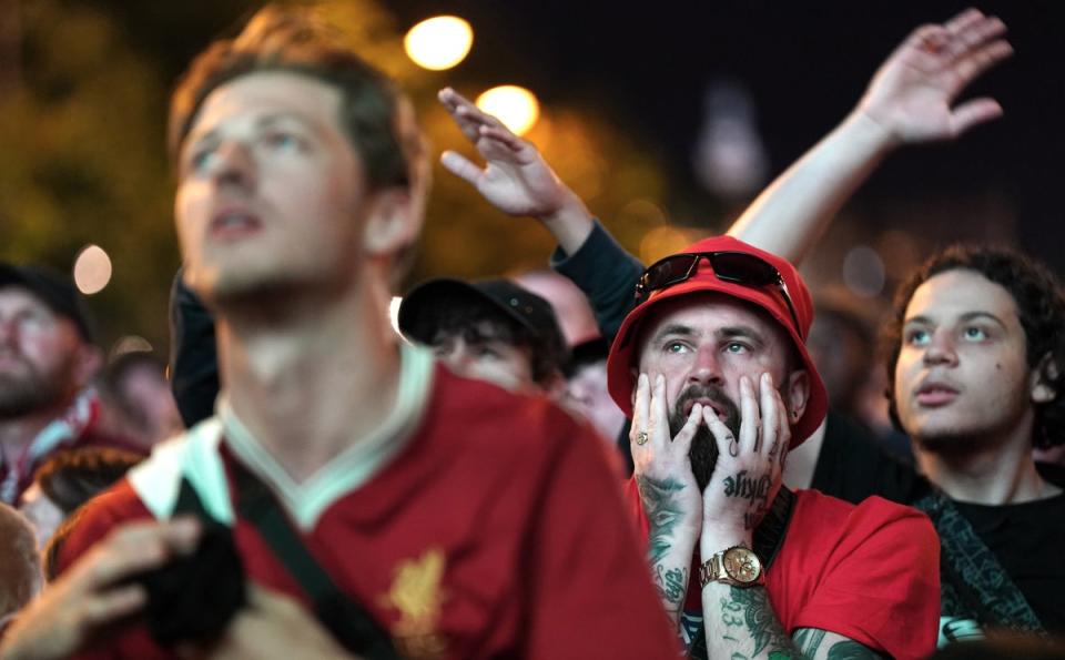 Liverpool fans in the fanzone in Paris, watching on the big screen their team losing to Real Madrid in the Champions League Final (Jacob King/PA) (PA Wire)