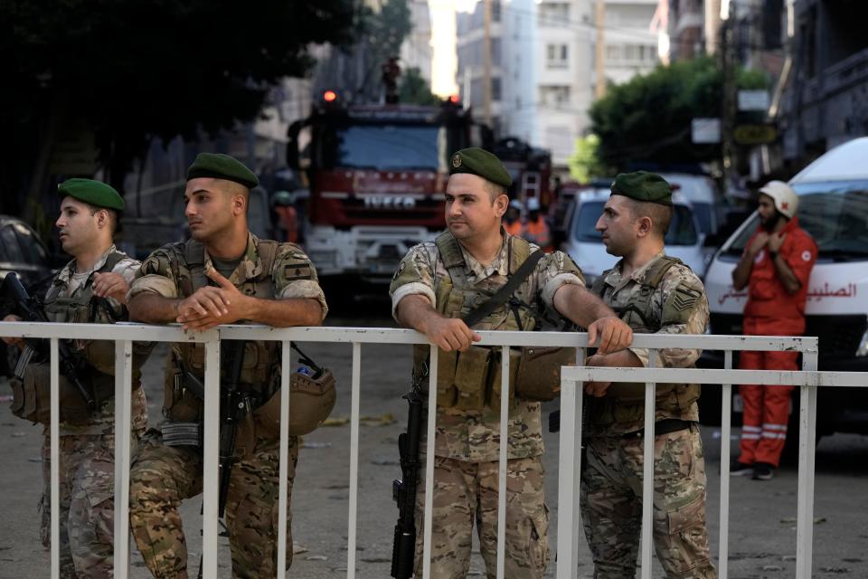 Lebanese soldiers secure the area of the missile strike on Saturday (Copyright 2024 The Associated Press. All rights reserved)