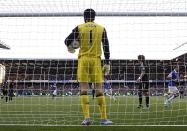 Chelsea's Petr Cech stands dejected after Everton's Steven Naismith (not in picture) scored his team's opening goal