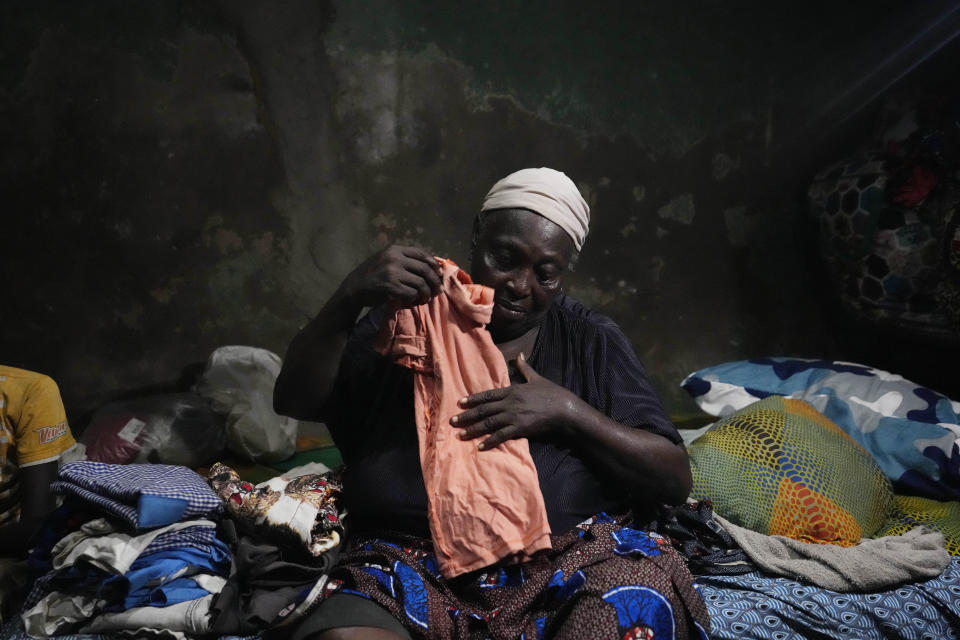 Malaria patient Funmilayo Kotun, 66-years-old, is photographed in her room in Makoko neighbourhood of Lagos, Nigeria, Saturday, April 20, 2024. (AP Photo/Sunday Alamba)