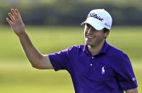 Ben Martin smiles after a birdie on the 17th hole during the opening round of the PGA Zurich Classic golf tournament at TPC Louisiana in Avondale, La., Thursday, April 24, 2014. Martin shot a course-record 10-under-par 62. (AP Photo/Gerald Herbert)