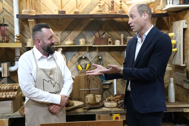 <p>Andrew Matthews - WPA Pool/Getty Images</p> Prince William visits Faithworks Carpentry Workshop on June 26