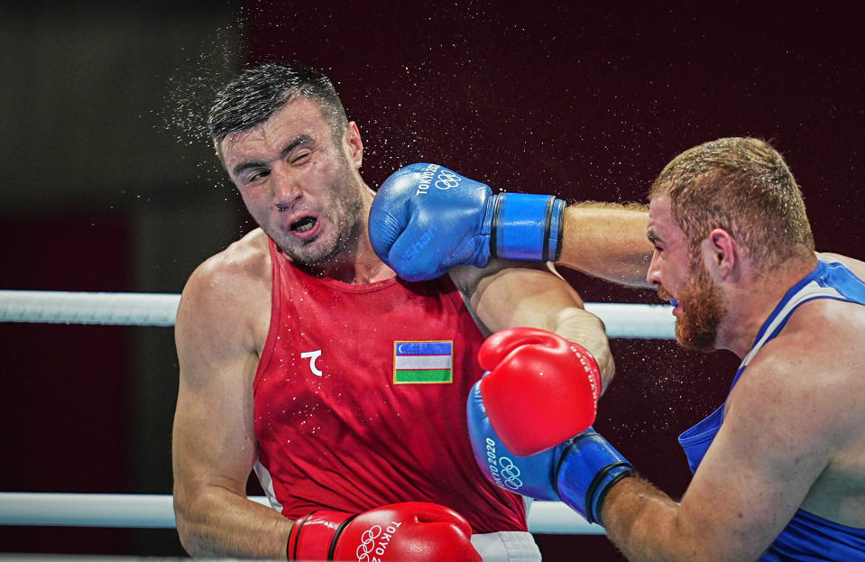 <p>Bakhodir Jalolov from Uzbekistan and Mahammad Abdullayev from Azerbijdan during pre final boxing knock out rounds at Kokugikan arena at the Tokyo Olympics, Tokyo, Japan on July 28, 2021. (Photo by Ulrik Pedersen/NurPhoto via Getty Images)</p> 