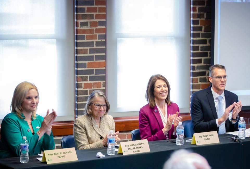 Rep. Ashley Hinson, R-Iowa, Rep. Mariannette Miller-Meeks, R-Iowa, Rep. Cindy Axne, D-Iowa, and Rep. Randy Feenstra, R-Iowa, take part in an Iowa Congressional Panel on Israel at the Iowa Bar Association in Des Moines, Tuesday, April 19, 2022.