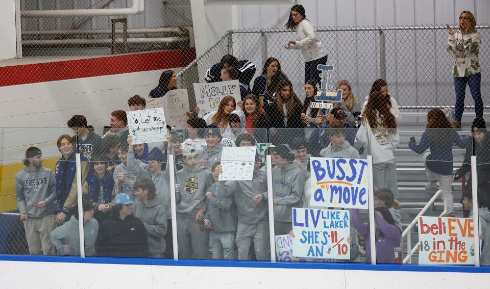 Webster fans show their support as the Lakers take on Ithaca in the first girls ice hockey game in Section V history.