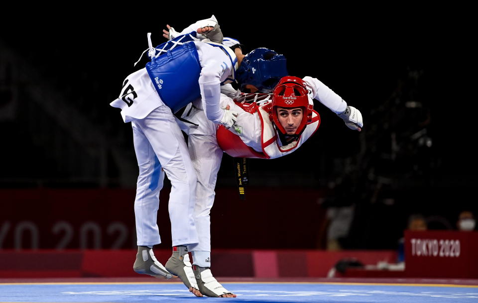 Tokyo , Japan - 24 July 2021; Jack Woolley of Ireland in action against Lucas Guzman of Argentina during the men's -58Kg taekwondo round of 16 at the Makuhari Messe Hall during the 2020 Tokyo Summer Olympic Games in Tokyo, Japan. (Photo By Brendan Moran/Sportsfile via Getty Images)