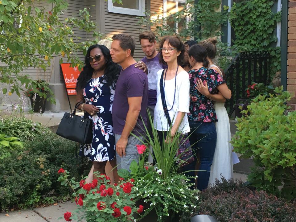 Justine Damond's fiance Don Damond is embraced by Valerie Castile, the mother of Philando Castile, during a&nbsp;rally in Minneapolis. (Photo: Hayley Miller)